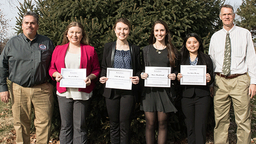 Six people standing in row, winners of ASI undergraduate research scholarships