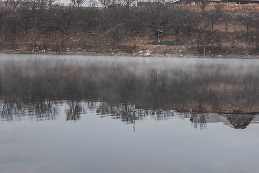 Kansas farm pond with reflection
