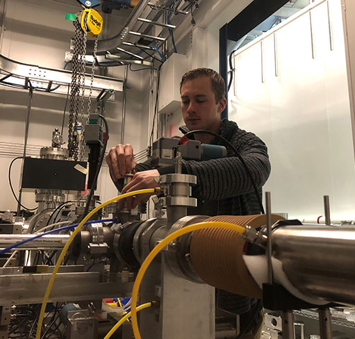 Man working with soil chemistry equipment Man working with soil chemistry equipment